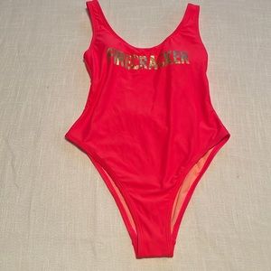 NEW. Size small one piece